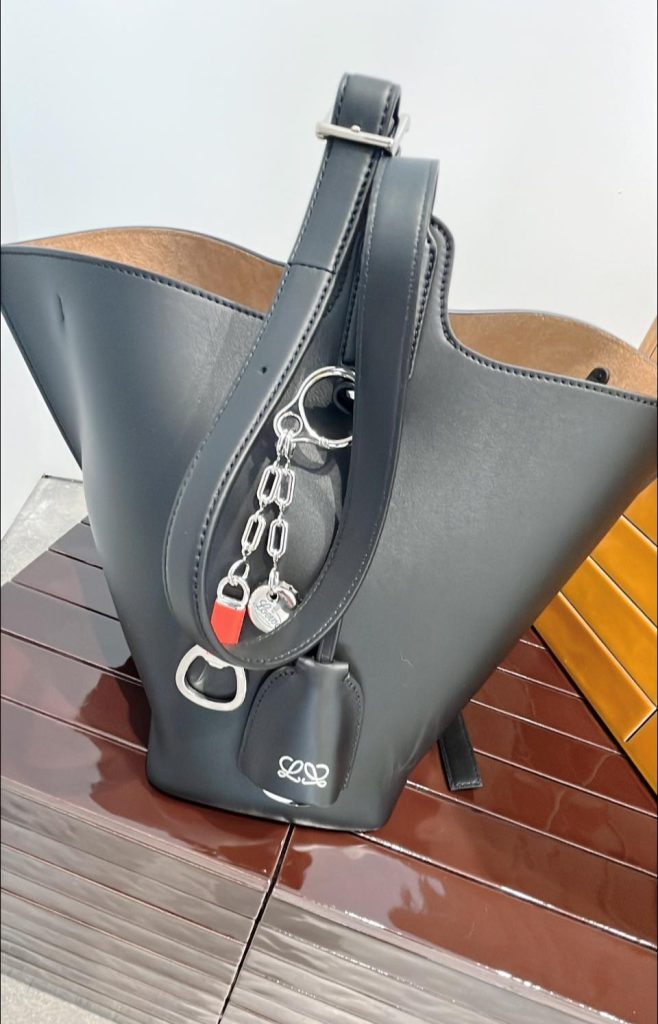 《單提、半敞口》你提的那個包 《單提、半敞口》你提的那個包